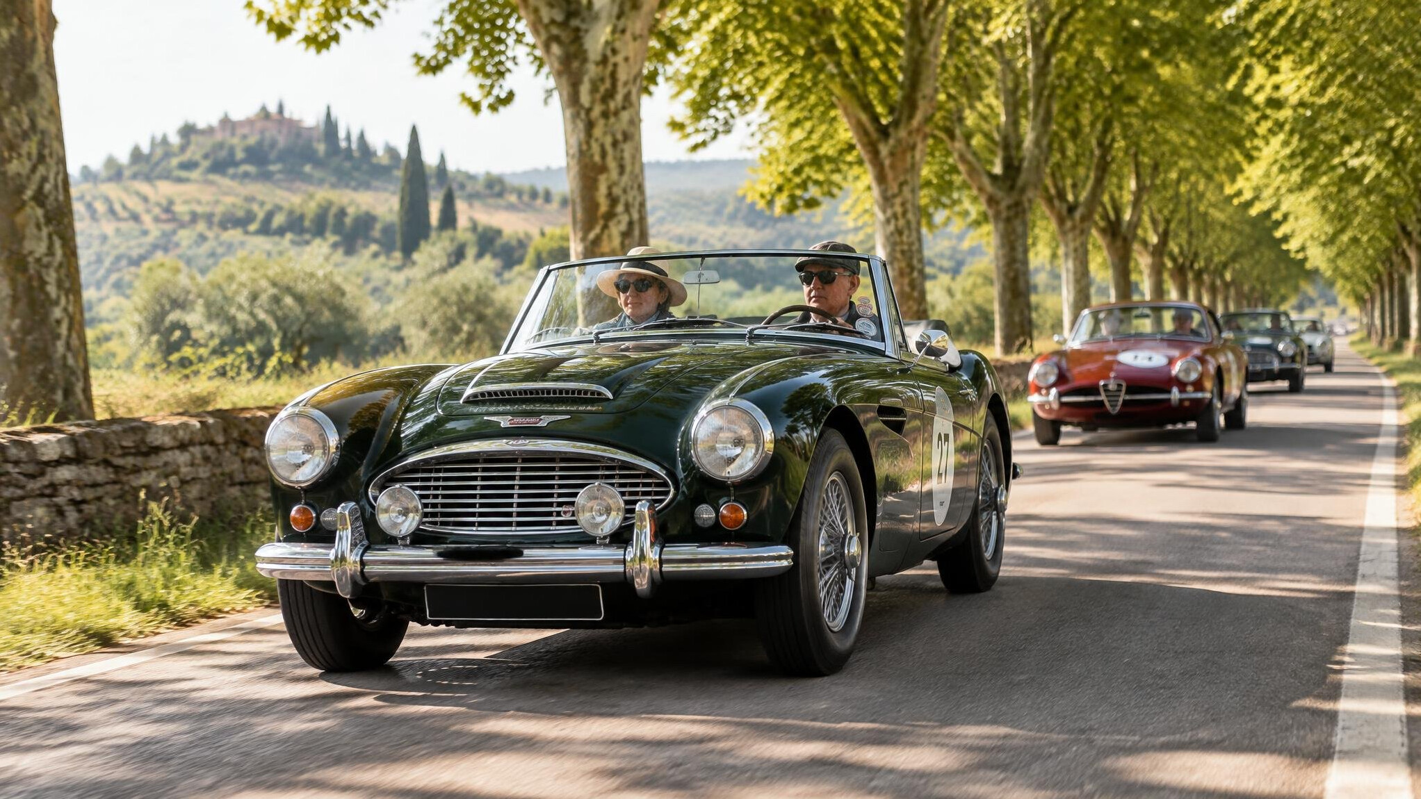 Classic car driving on a country road